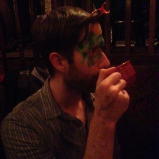 Carl having his face painted and sipping the concoctions from the open absinthe bar
